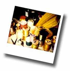 Some of Sidney's fly tying materials, including feathers, bobbins, thread and hand tools.